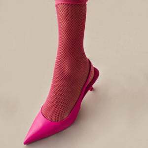 Close-up of fuchsia quarter length mesh sock with matching open shoe