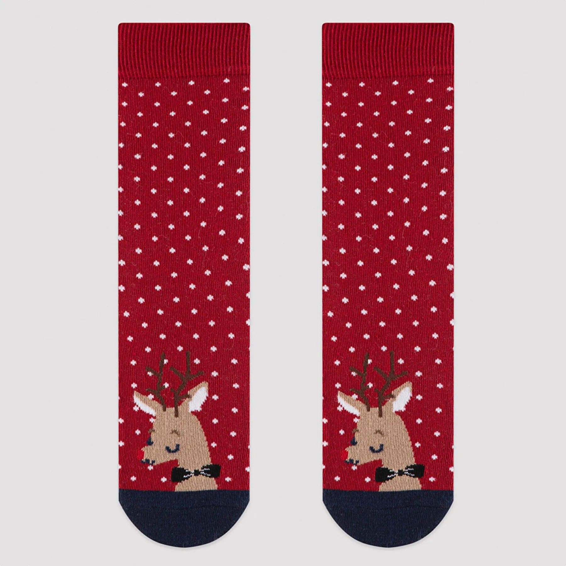 Red socks with white dots and reindeer image