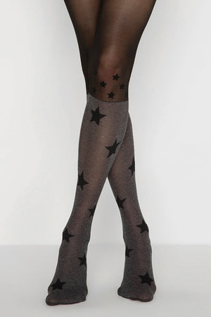 image of woman wearing black socks and stars patterned pantyhose