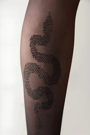 Close-up of black sheer tights featuring a rhinestone snake design on the calf.