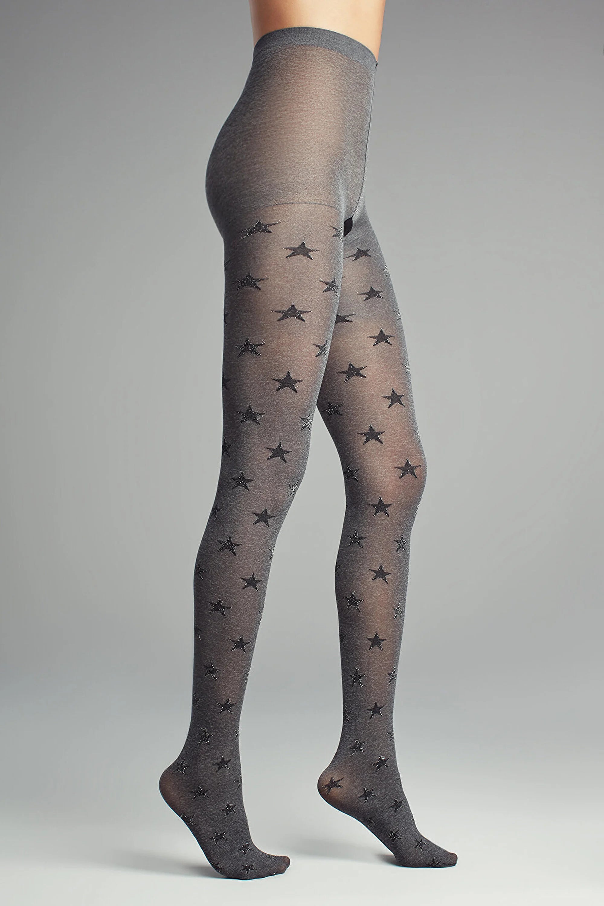 image of woman wearing grey star star tights