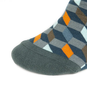 Video of man wearing grey confetti patterned socks
