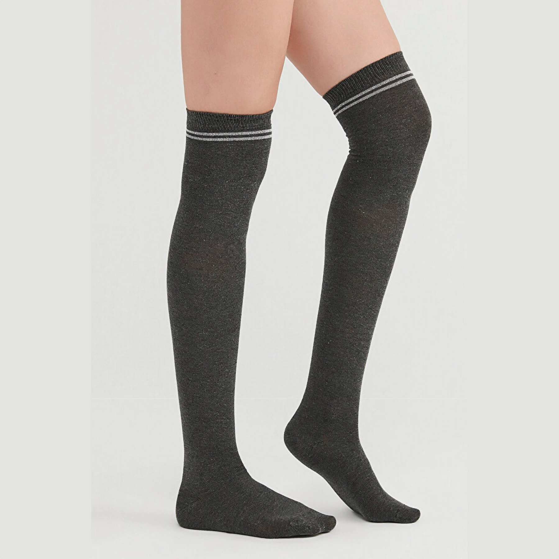 image of woman wearing grey thigh high socks