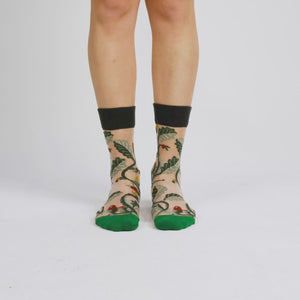 video of sheer socks with plant detail