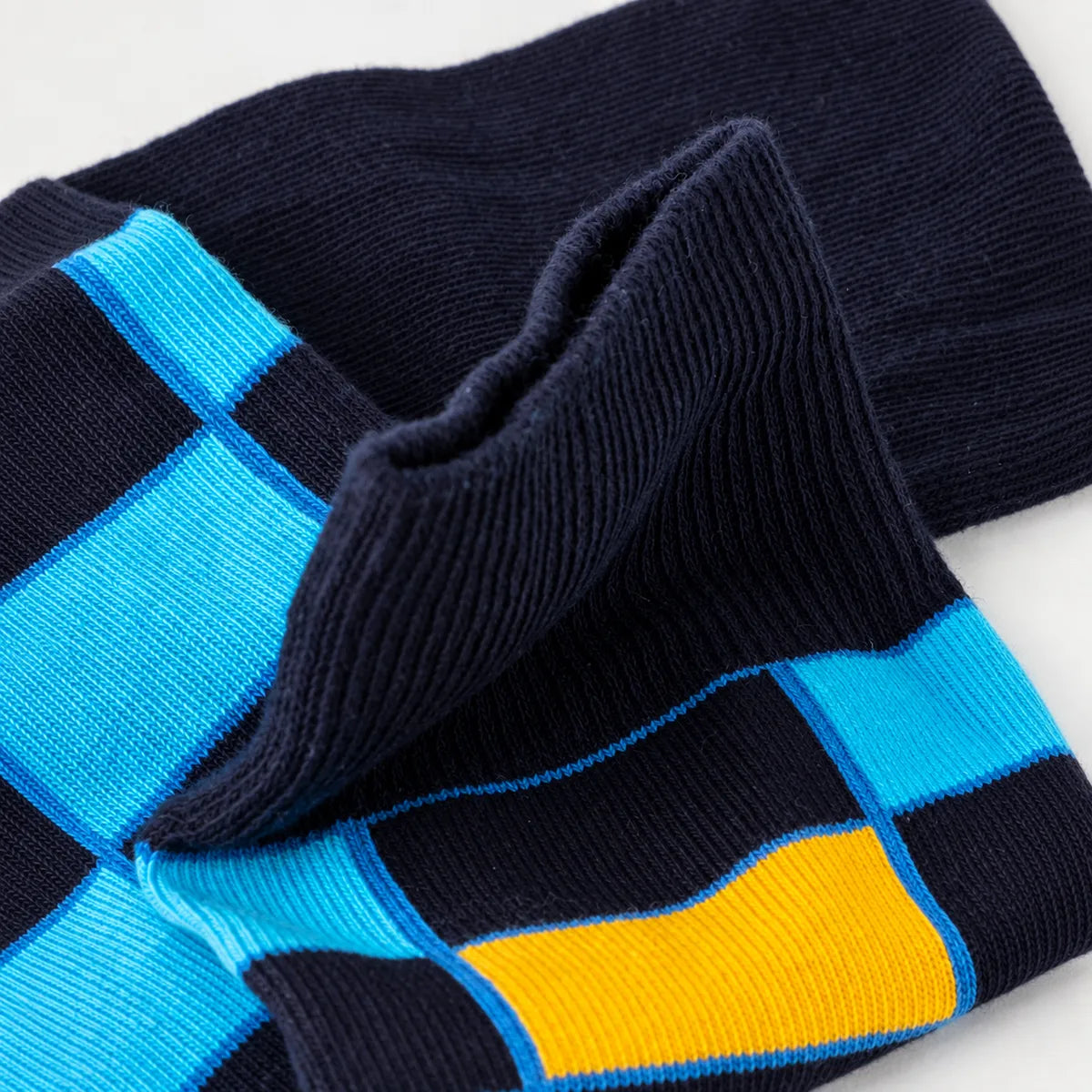 image of light and dark blue checked crew socks