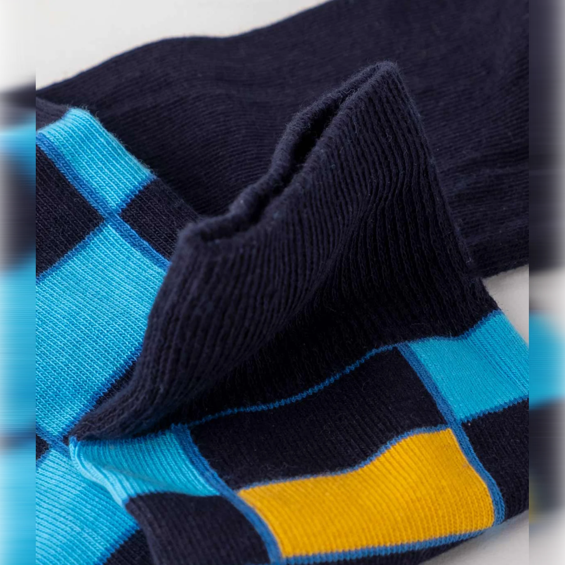 image of light and dark blue checked crew socks