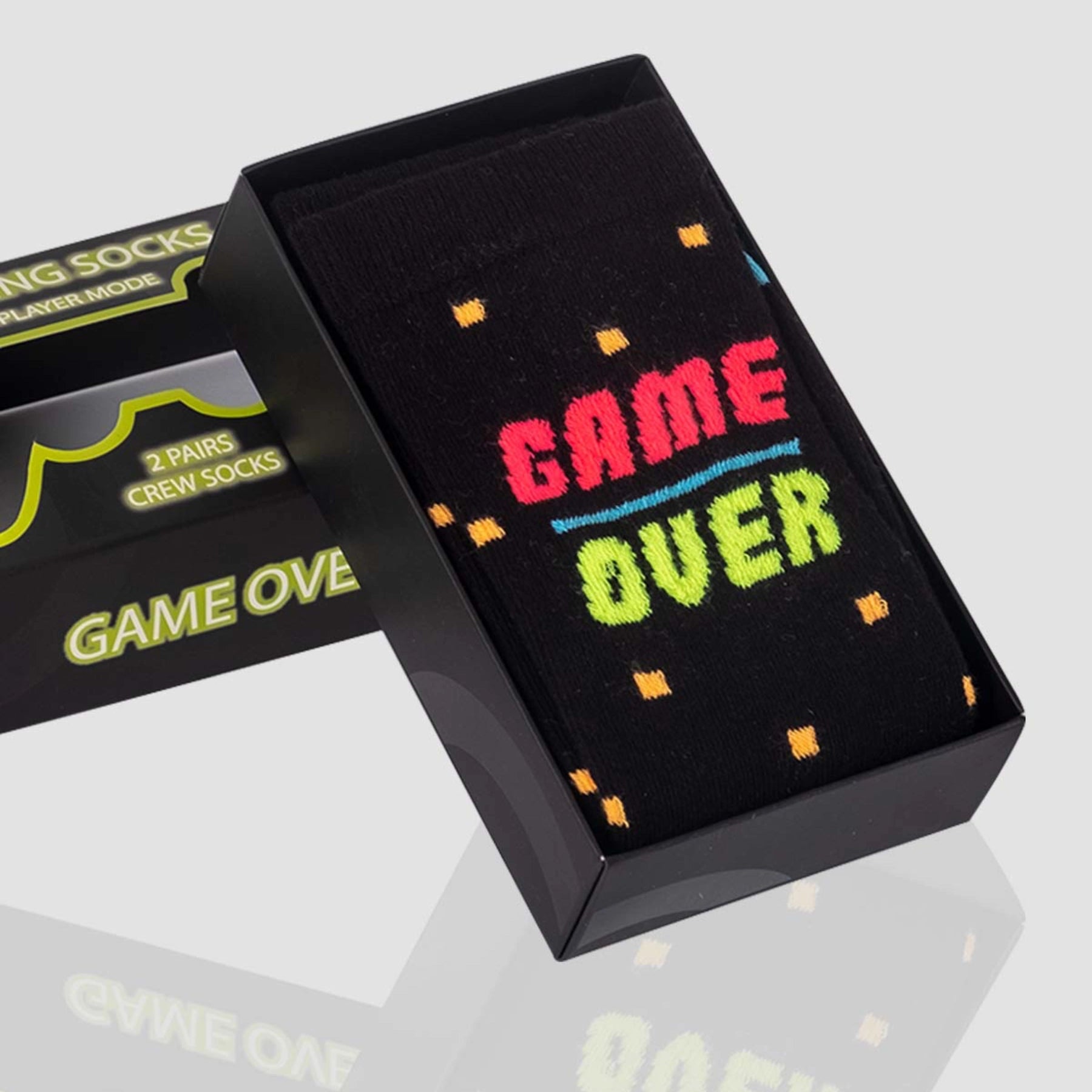 photo of 2 pairs of 'gamer'-themed crew socks in gift box