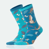 photo of mismatched leopard-themed crew socks