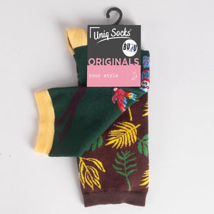 photo of mismatched jungle-themed crew socks