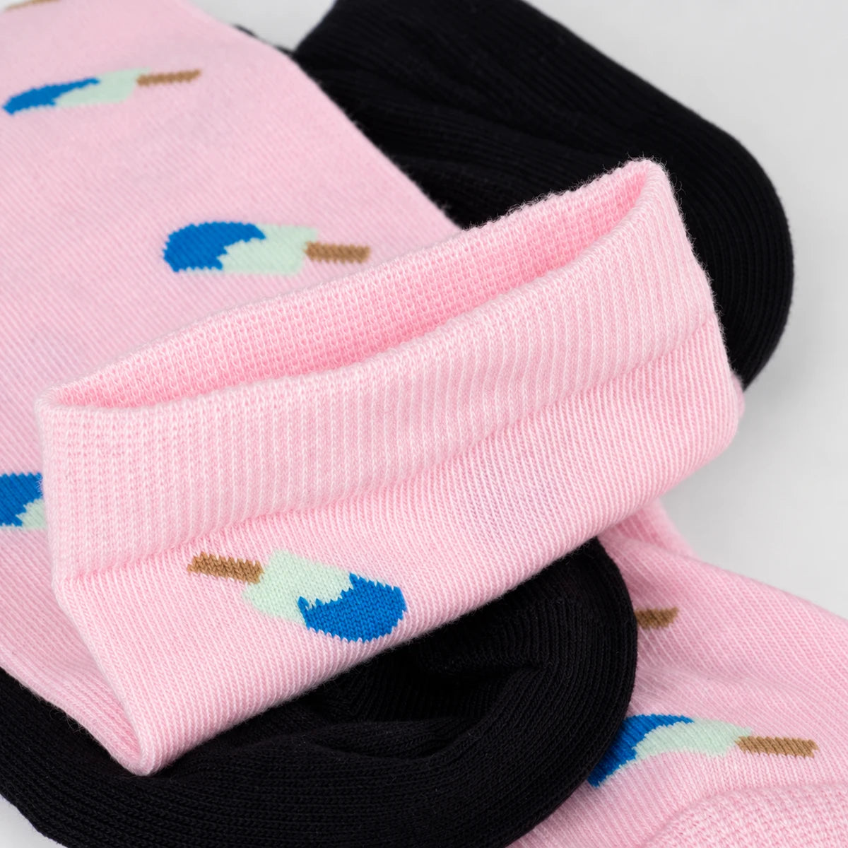 photo of dark blue and pink icecream-themed crew socks