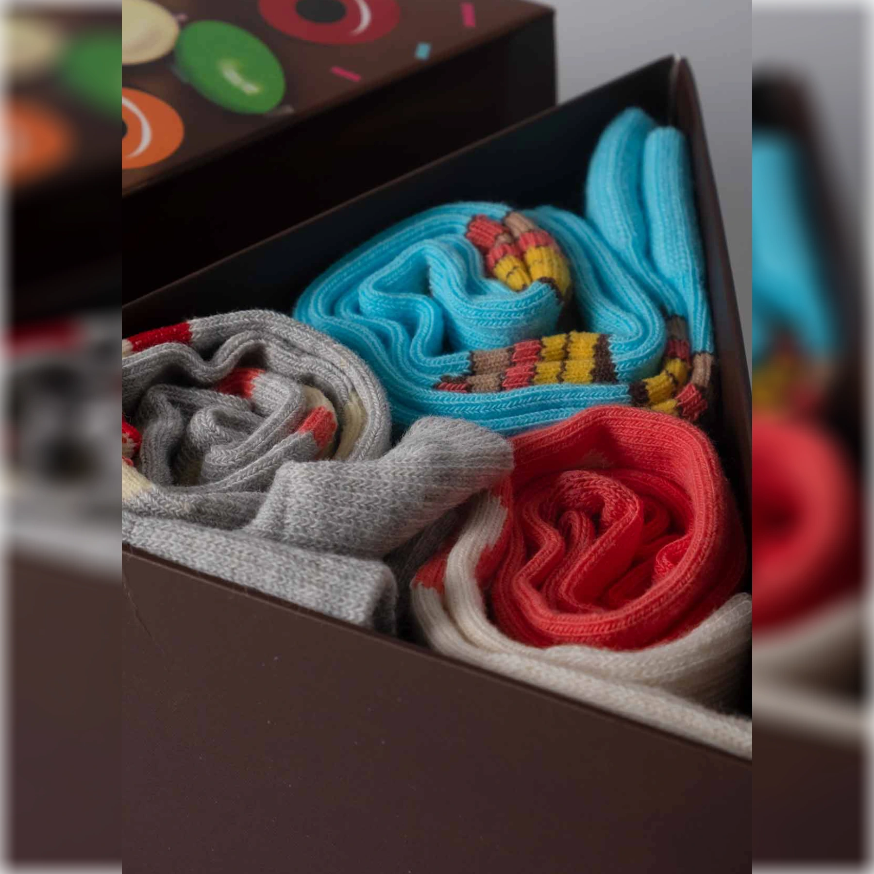photo of 3 pairs of assorted cake-themed crew socks in gift box