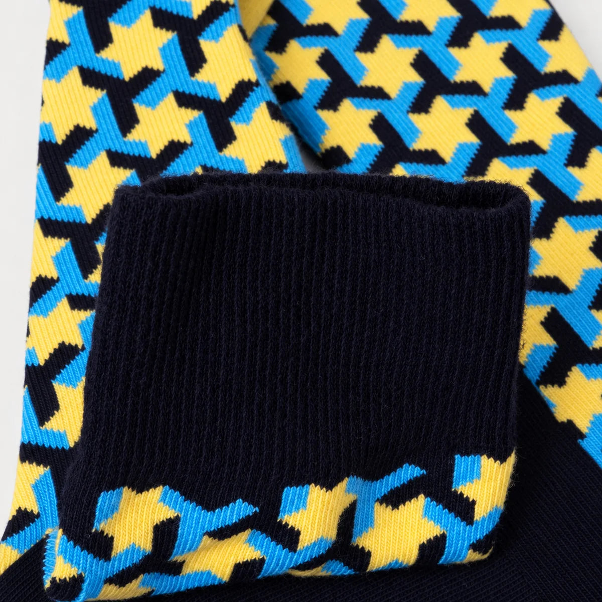 image of blue, navy and lemon coloured star themed crew socks