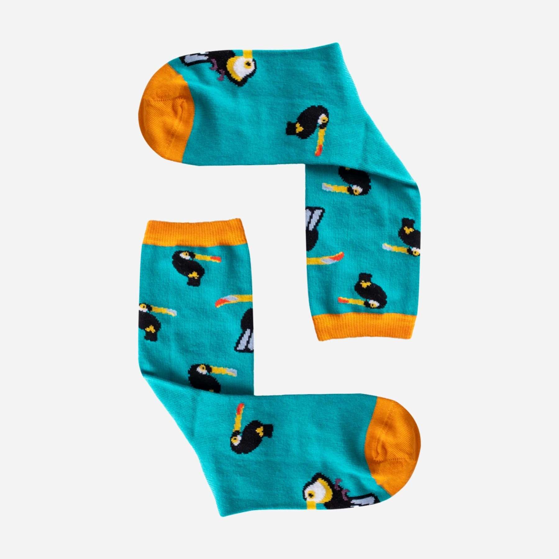 photo of turquoise crew socks with toucan images