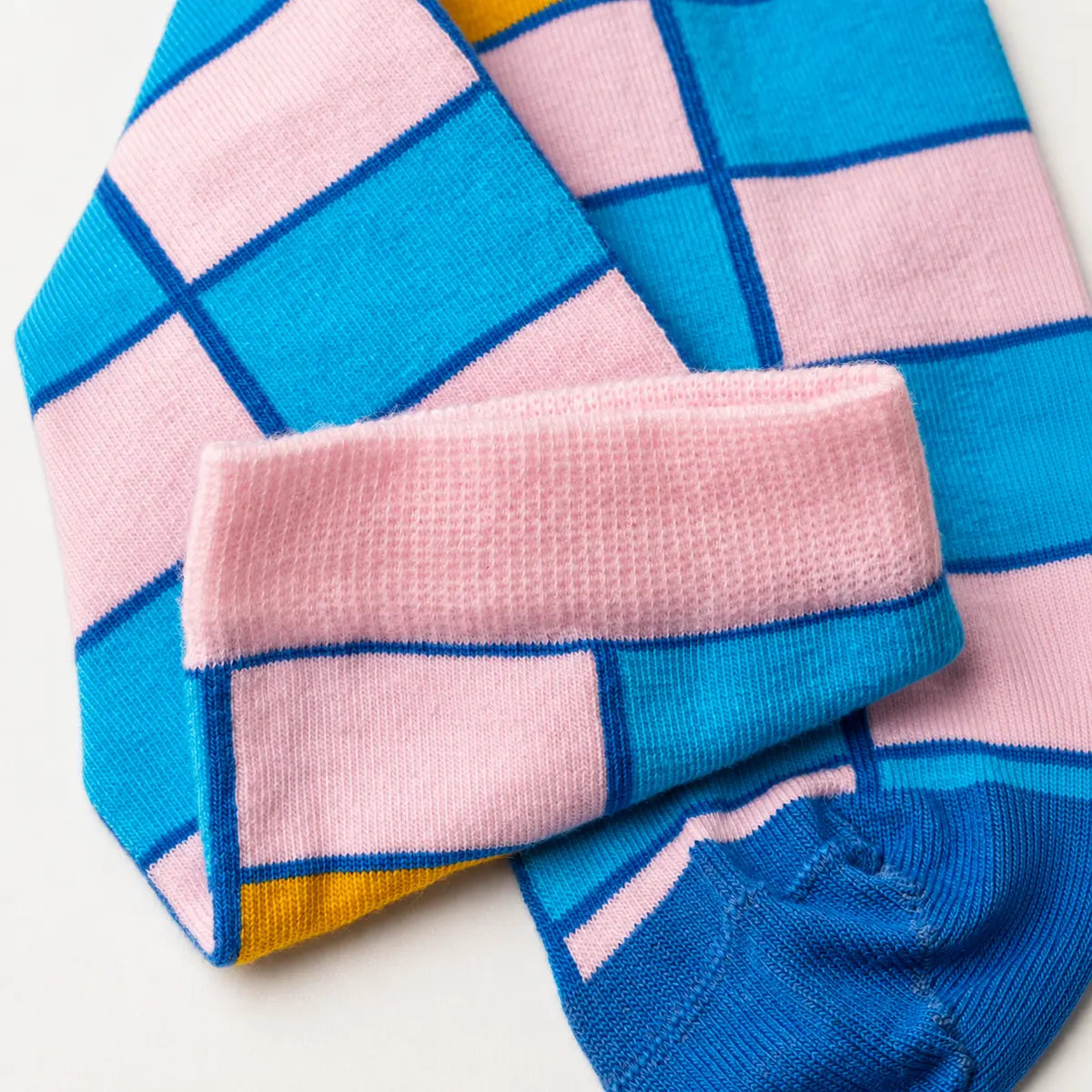 image of light blue and pink checked crew socks