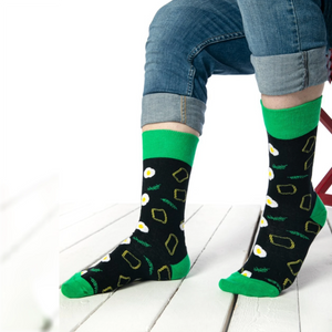 photo of dark blue and green egg-themed crew socks