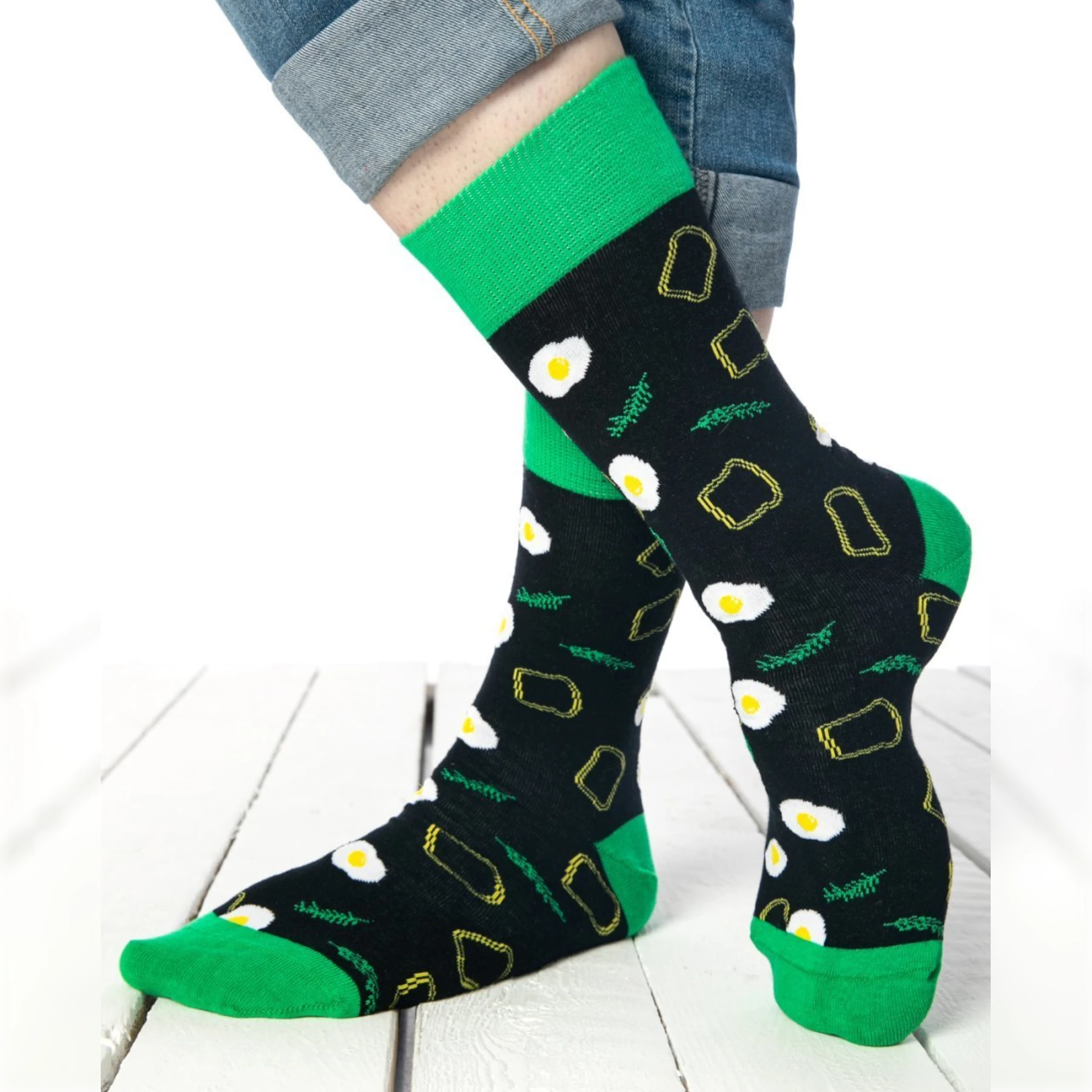 photo of dark blue and green egg-themed crew socks