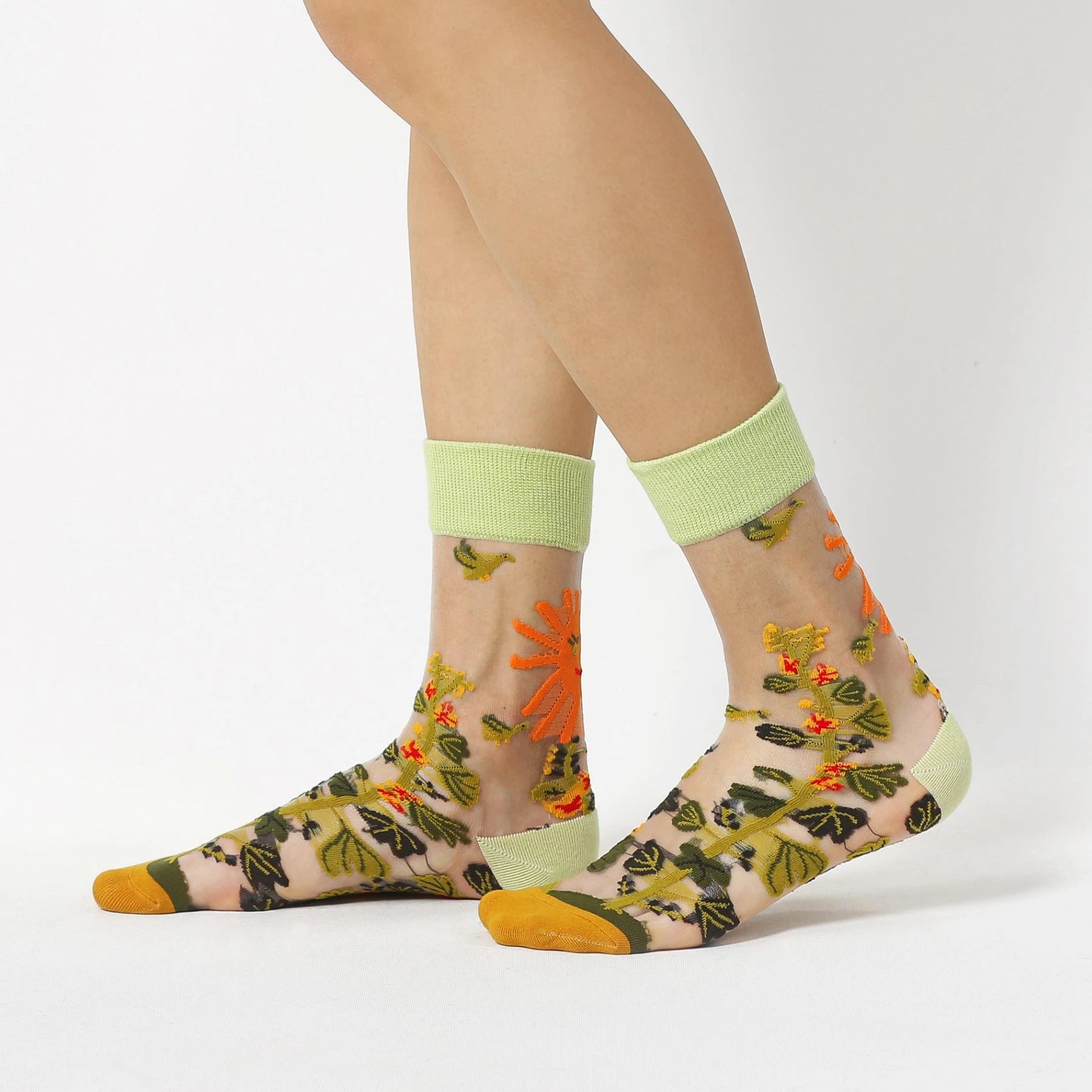 image of sheer socks with plant detail