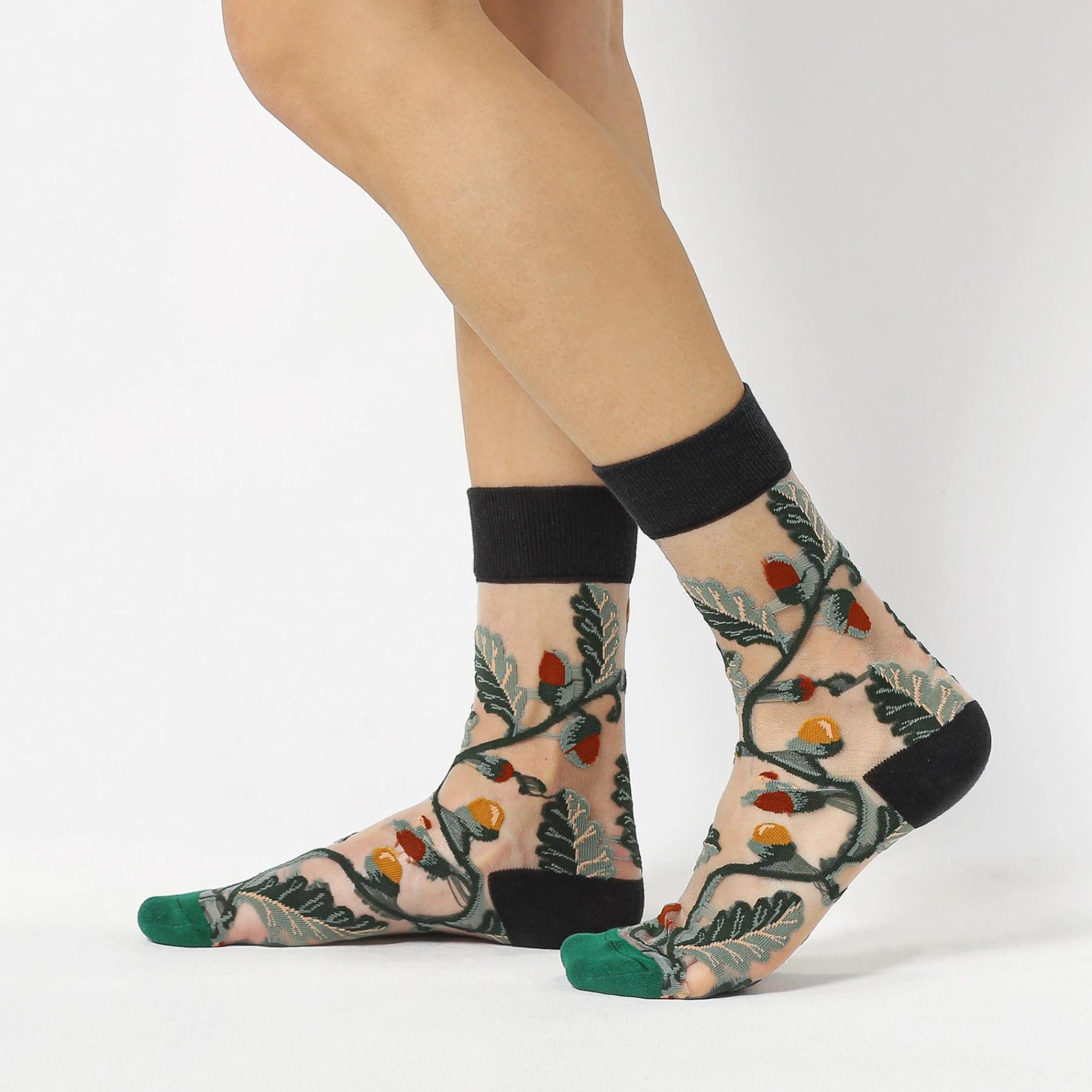 image of sheer socks with plant detail