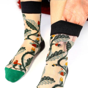 image of sheer socks with plant detail