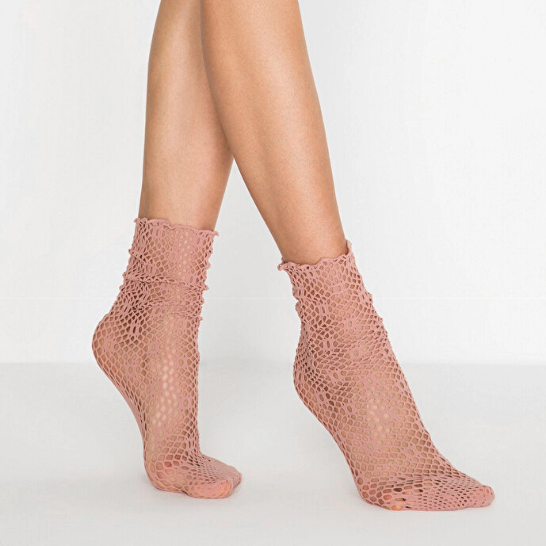 person wearing baggy nude coloured quarter length socks lace inspired