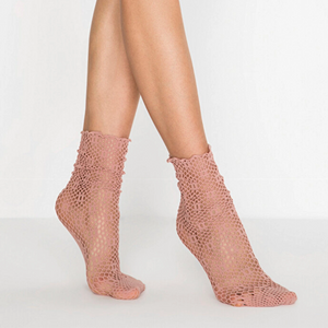 person wearing baggy nude coloured quarter length socks lace inspired