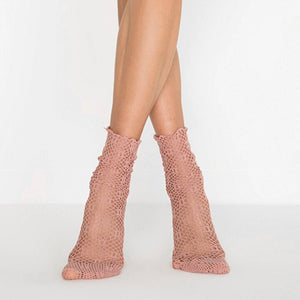 person wearing baggy nude coloured quarter length socks lace inspired